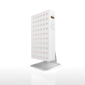 The Joovv Mini 3.0, a small white red light panel on a tabletop stand.